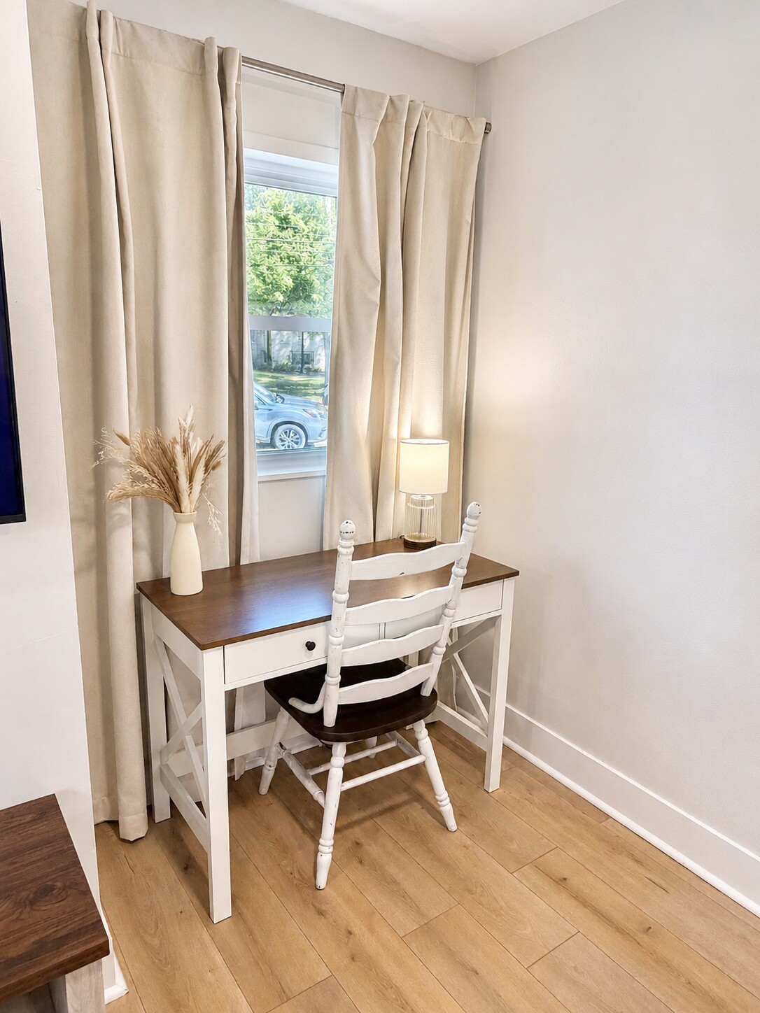Dedicated writing desk beside a window